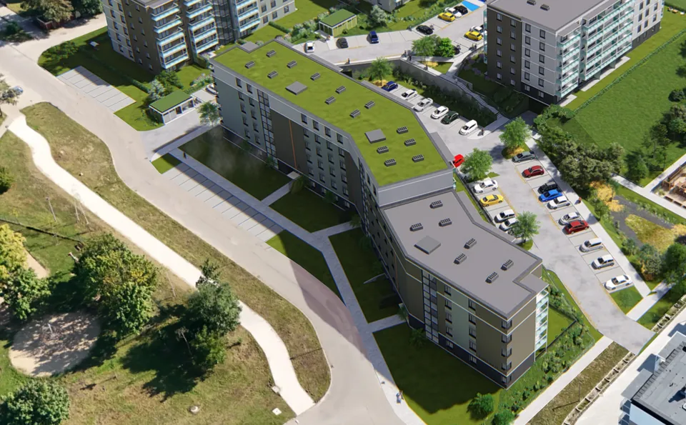 Wizualizacja z lotu ptaka: budynki wielorodzinne z zielonym dachem i parkingiem